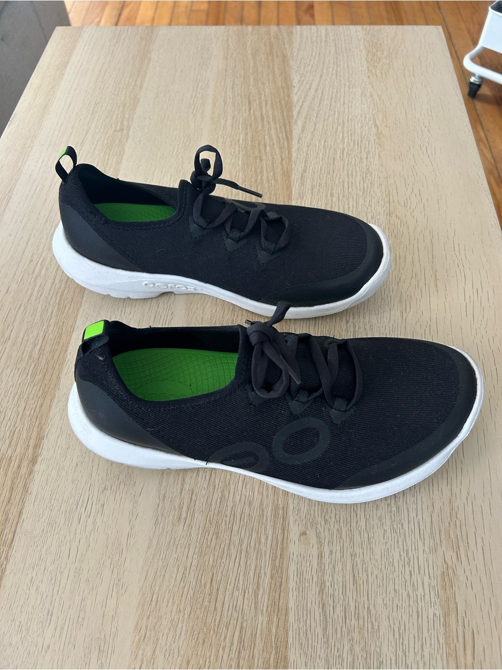 OOFOS Black Slip-On Sneakers with Green Insole Accent